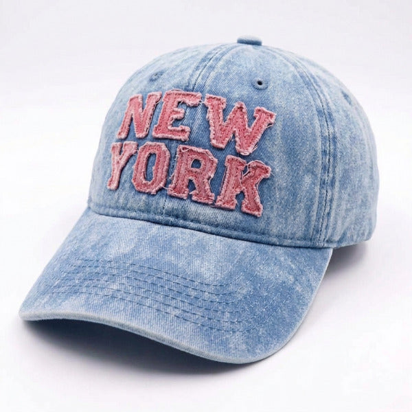 Gray cap with 'New York' text in red on a white background