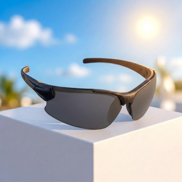 Sport sunglasses with a black frame and gray lenses, shown at an angle on a plain white background.
